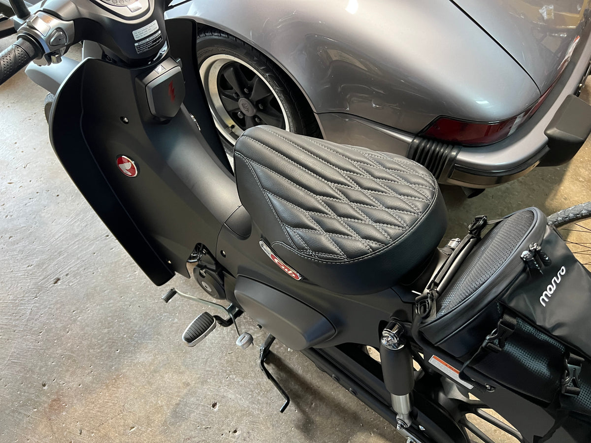 Honda Super Cub black diamond pleat seat cover installed