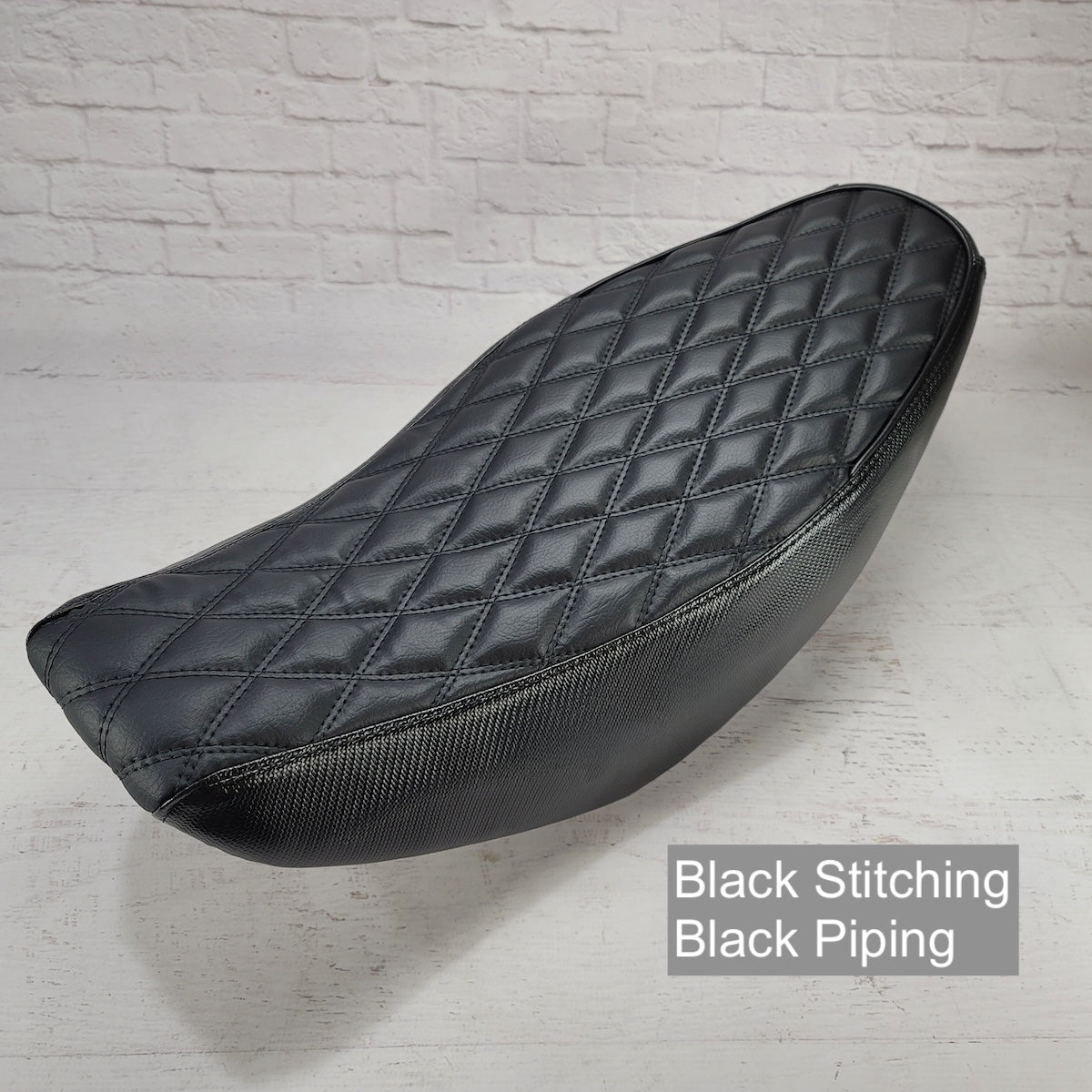 Honda Navi double-diamond seat cover with black stitching and piping