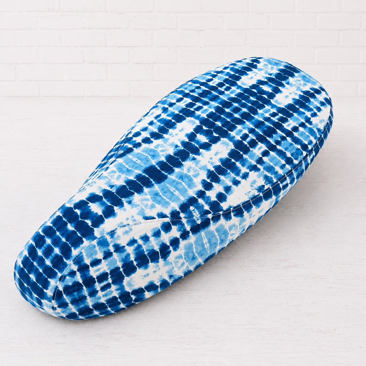 Shibori Tide scooter seat cover with an indigo-and-white tie-dye pattern for Vespa, Kymco, Honda and more, handmade by Cheeky Seats.